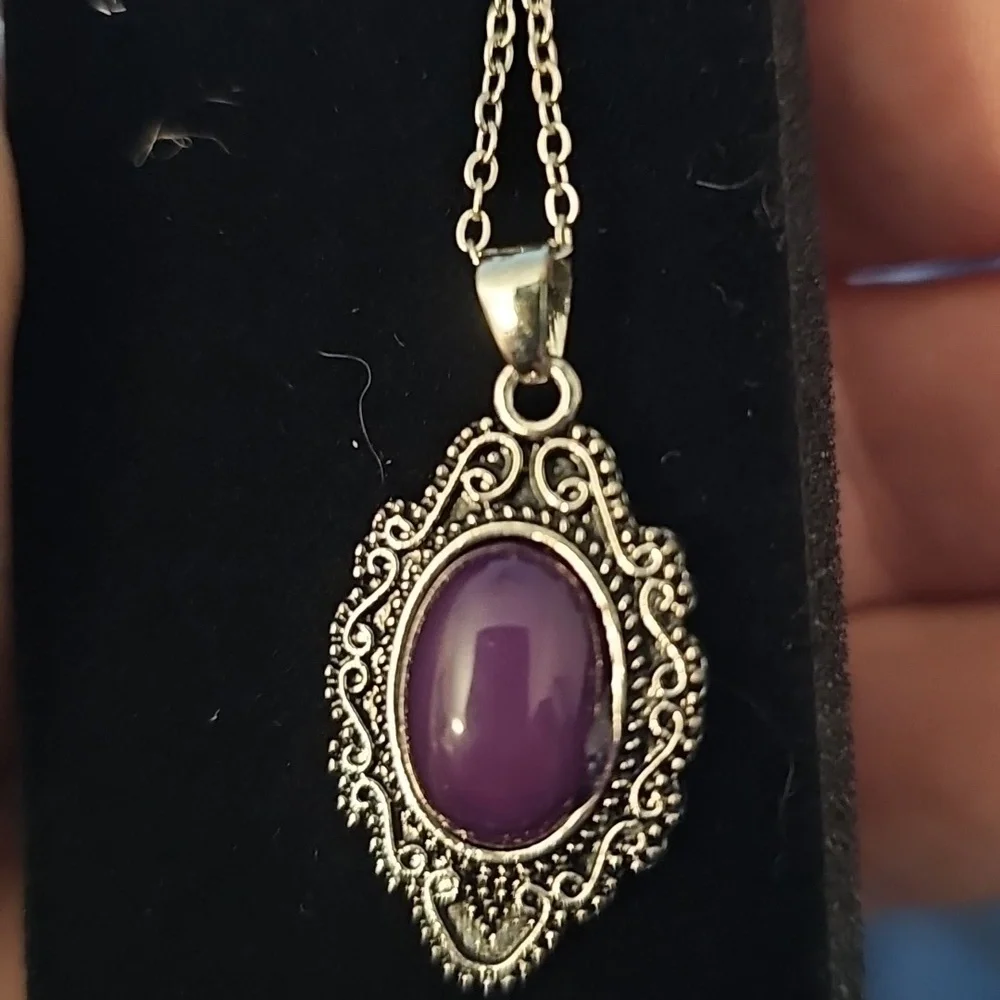 Elegant Silver Necklace with Purple Pendant